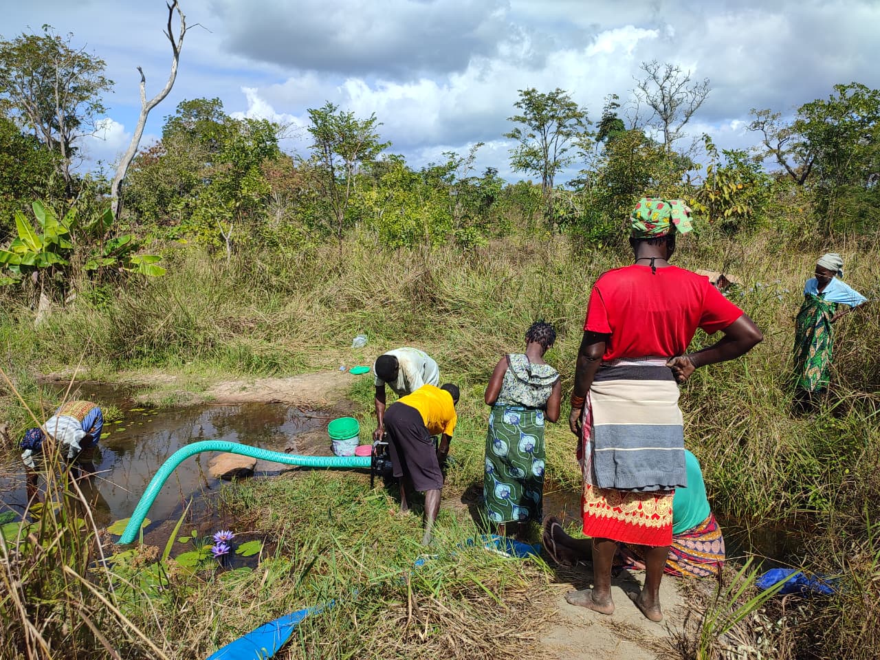 Testing irrigation pump operation in the field.